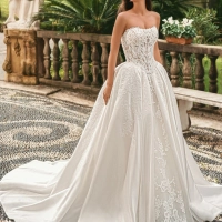 Enzoani Windsor luxury ballgown wedding dress featuring a lace corset bodice, sweetheart neckline, satin skirt and dramatic cathedral train.