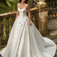 Enzoani Wisteria luxury satin ballgown wedding dress featuring a structured bodice, scoop neckline, architectural draping and dramatic cathedral train.